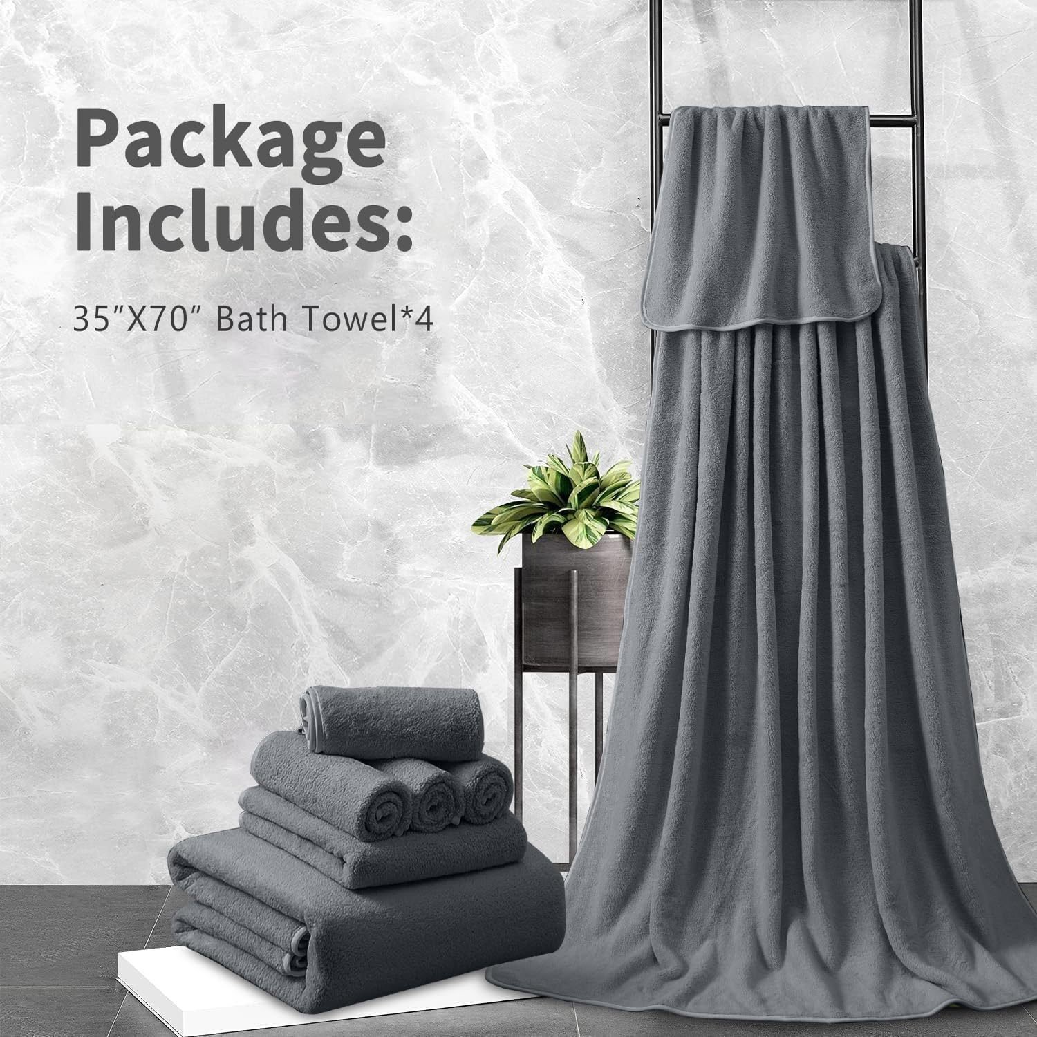 Grey coral fleece bath towels folded and hanging on a towel rail